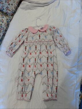 Pink-Collared Nutcracker Print Baby One-Piece